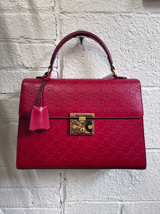 Gucci Guccissima Signature Medium Padlock Top Handle Leather Bag in Hibiscus Red