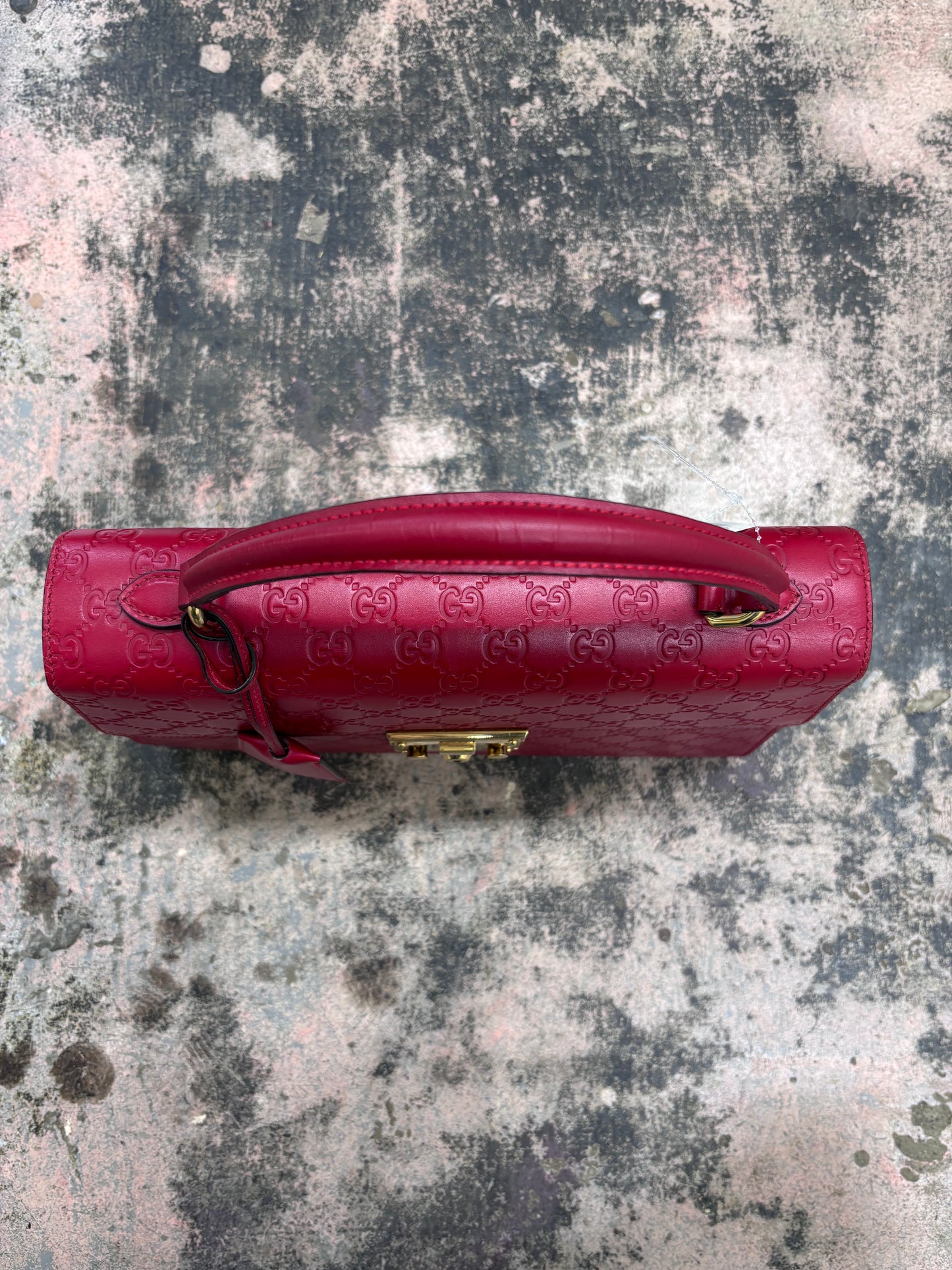 Gucci Guccissima Signature Medium Padlock Top Handle Leather Bag in Hibiscus Red