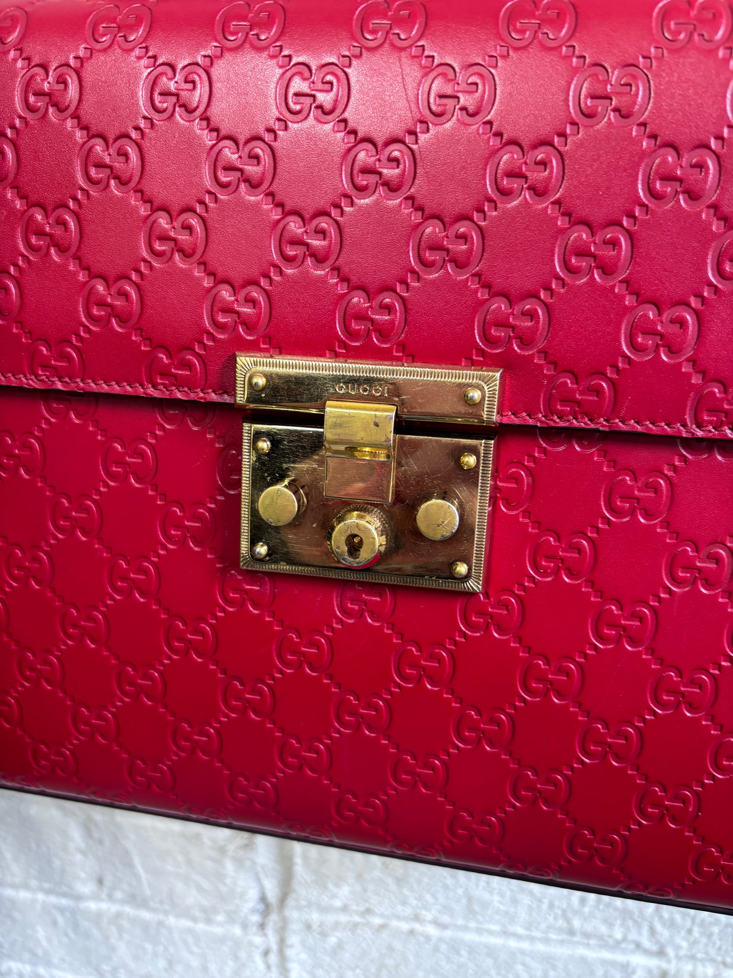 Gucci Guccissima Signature Medium Padlock Top Handle Leather Bag in Hibiscus Red